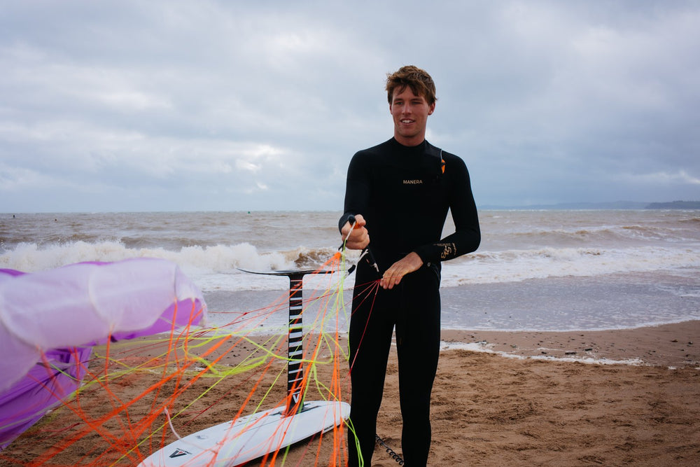 Guy heading out with his foil board